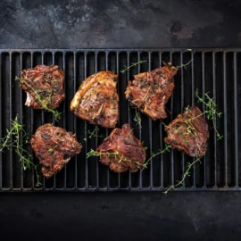 Barbecued lamb chops on a griddle