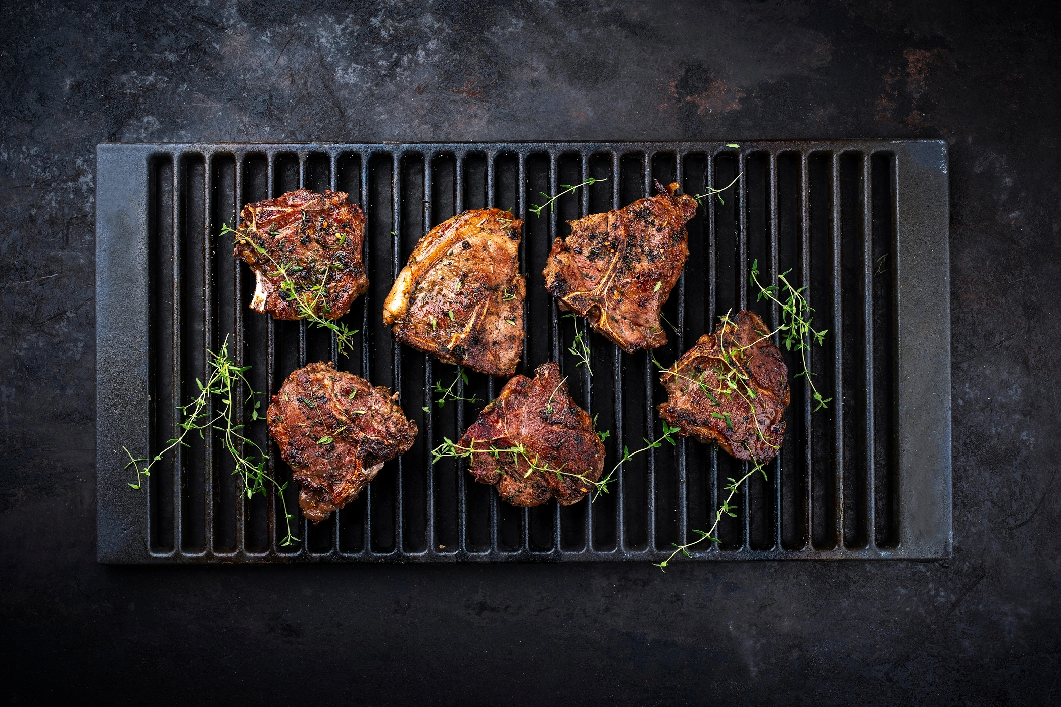 Barbecued lamb chops on a griddle